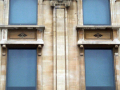 Windows at the top of the building