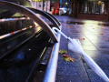 Umbrella against a bench