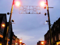 Houses surrounded by lights	