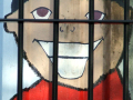 Mural detail of boy behind railings