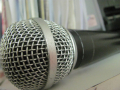 A close up of a microphone used in the recording studio