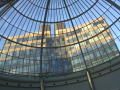 Building’s seen through glass dome	