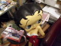 Doll in antique shop