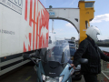 trucks, cars and motorbikes on the ferry