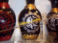 Three vases with a sword and glass	stand 
