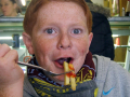 Boy eating chips