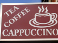 ‘Tea, coffee, cappuccino’ sign