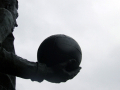 Statue holding ball 
