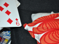 Playing cards and cushion