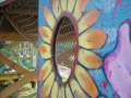 Wooden flower with rope mesh.