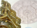 pattern behind a golden statue