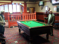 people playing pool