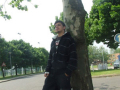 leaning against a tree