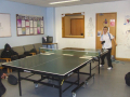 boy playing ping pong