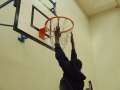 boy playing basketball