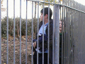 boys behind park railings