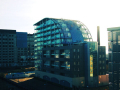 Two buildings, old mill house and modern building  a high standard block of apartments. 