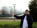 boy pointing out Thames barrier