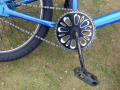 Bicycle pedals and chain connecting to back wheel