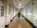 School hall with Wesley walking