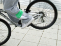 UELDockside04.jpg	Young person balancing their bike on front wheel
