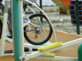 Bicycle wheel with curved gym equipment
