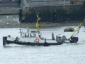 tug pulling barge