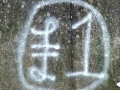 £1 sign on wall