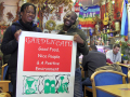 Young people holding poster