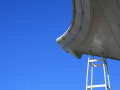 Corner of the Roof Against Blue Sky