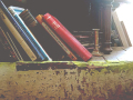 Piles of books on the top of the stairs
