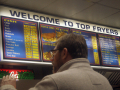back view of the man and you can see the menu as well	