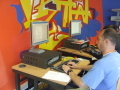 Computer room-man working on computer